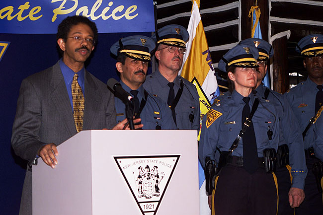 Acting Attorney General Peter Harvey with State Police command staff personnel